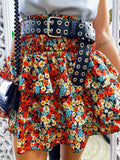 Gonna a balze con fiori rossi e verdeacqua