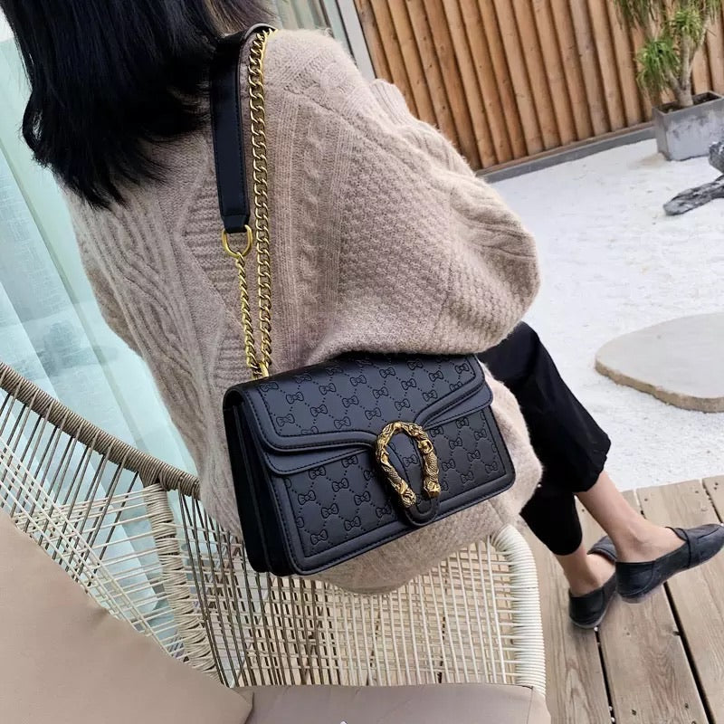 Pochette eco-pelle con ferro di cavallo