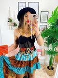 Gonna asimmetrica azzurra e Camel