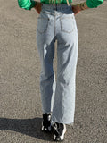Jeans wide leg con strappi e dettaglio