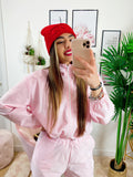 Completo sportivo con righe Rosa