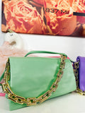 Pochette a mano con catena colori accesi