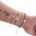 Bracciale con mondo e dettagli argento