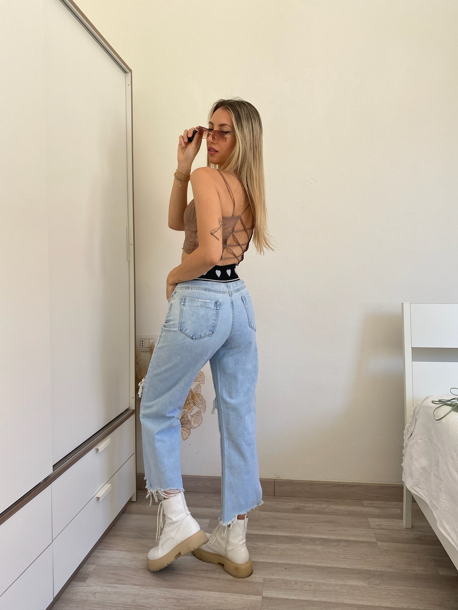 Jeans con elastico e cuori