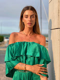 Tutina verde scollo a barchetta e balze