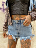 Short jeans con borchie