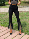 Pantaloni a zampa con strass