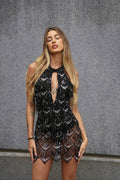 Abito con frange e paillettes nero