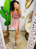 Tutina con paillettes rosa