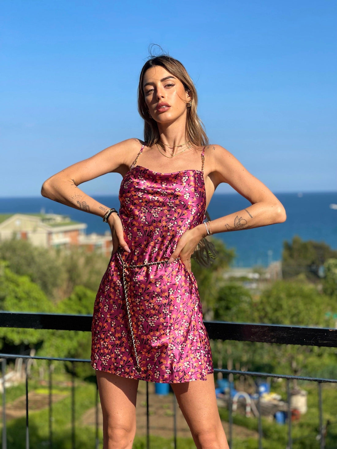 Abito a fiori fuxia