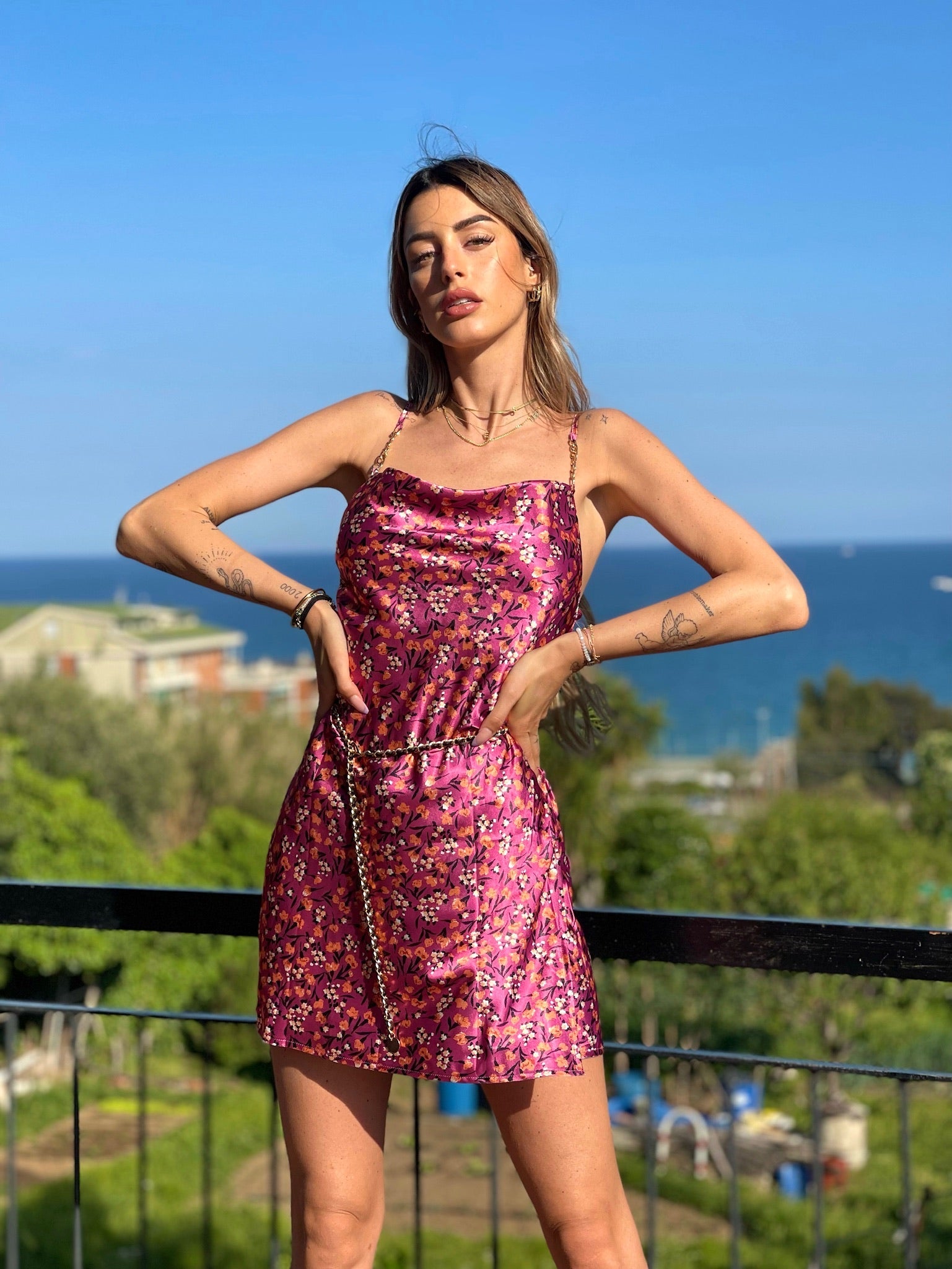 Abito a fiori fuxia