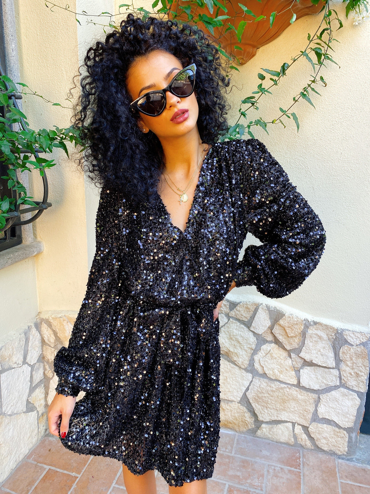 Abito con paillettes manica lunga nero