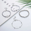 Bracciale con mondo e dettagli argento