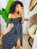 Abito lungo con scollo a barchetta con pois nero