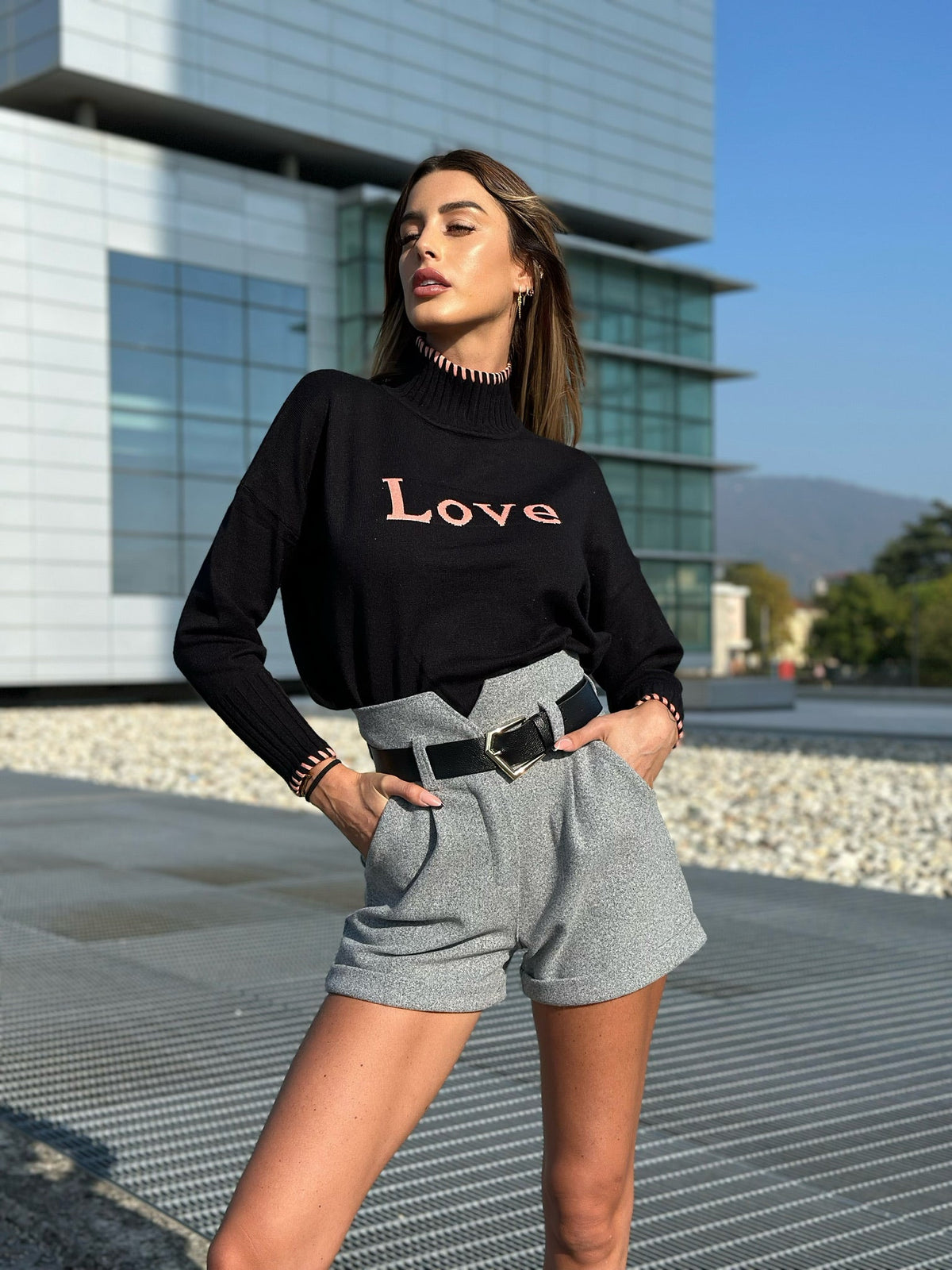Pull nero e rosa