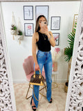 Jeans a vita alta con spacco inferiore