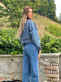 Giaccone di jeans con borchie