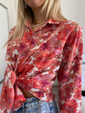 Camicia floreale corallo