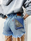 Short Levi’s Vintage bagno chiaro con borchie