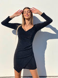 Abito glitter nero scollo a cuore