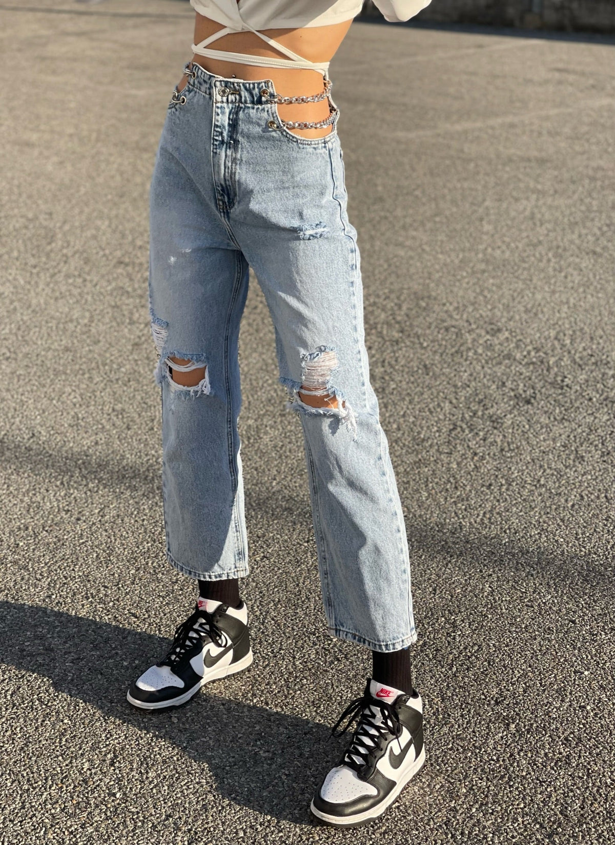 Jeans con catena argento