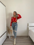 Cardigan rosso con cuori