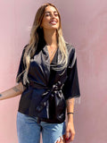 Blusa o kimono con frange