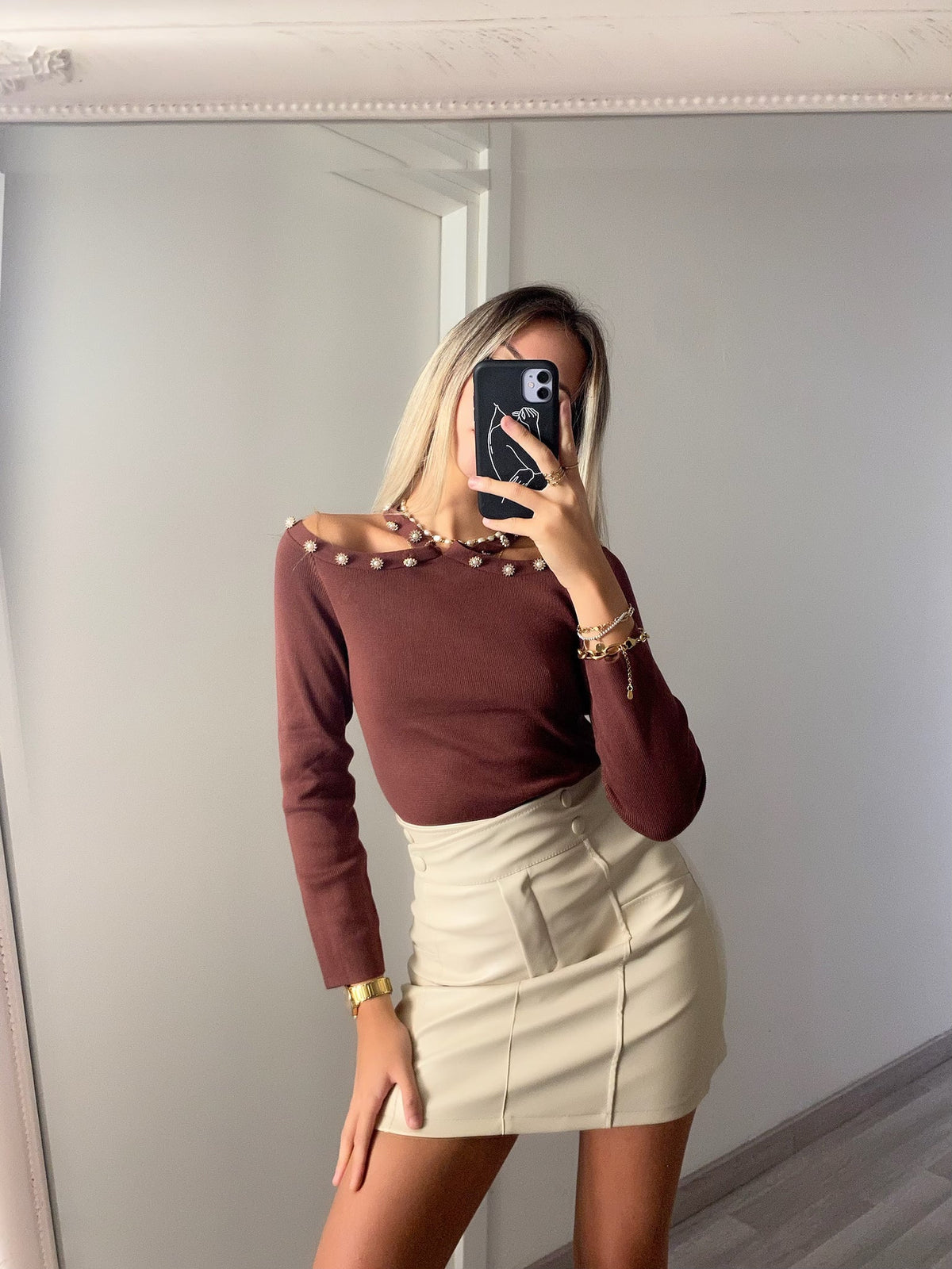 Gonna in ecopelle con bottoni beige