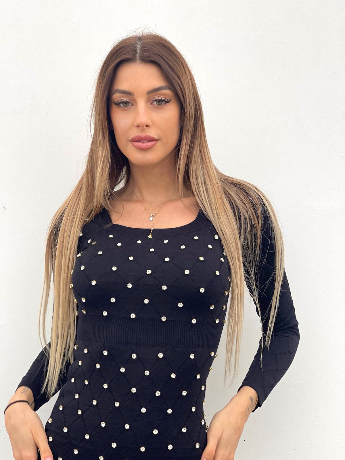 Abito in maglia con strass nero