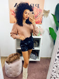 Maglione a trecce nude