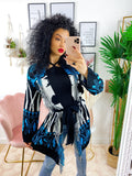 Cardigan frange e cinta sfumature azzurro