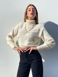 Maglione collo alto con rose Panna