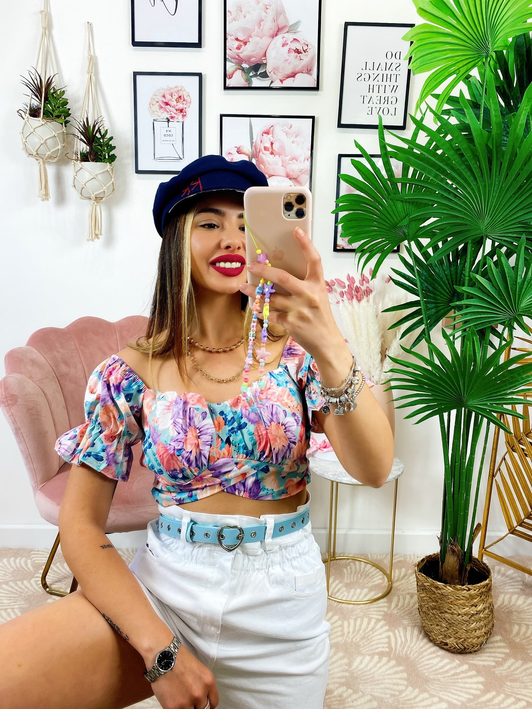 Top floreale con cintura
