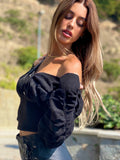 Maglione nero con lacci