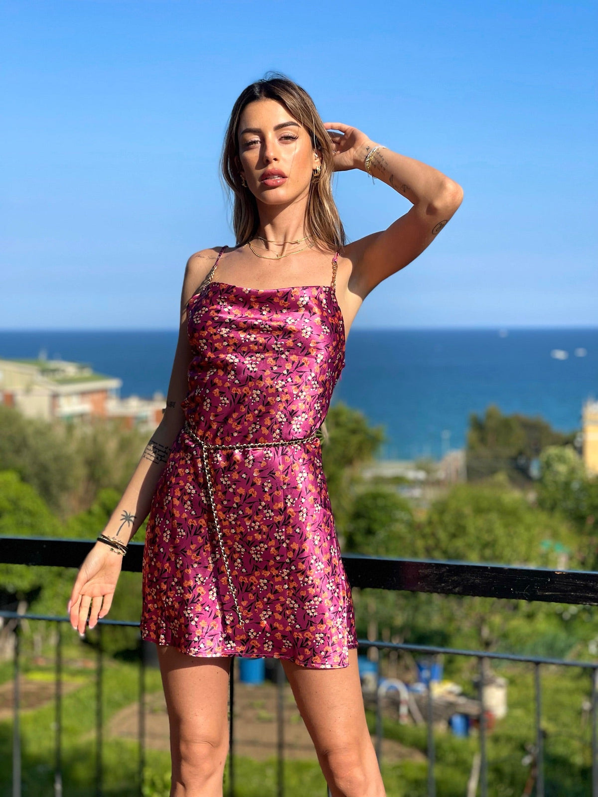 Abito a fiori fuxia