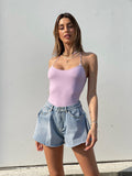 Body aderente con incroci lilla