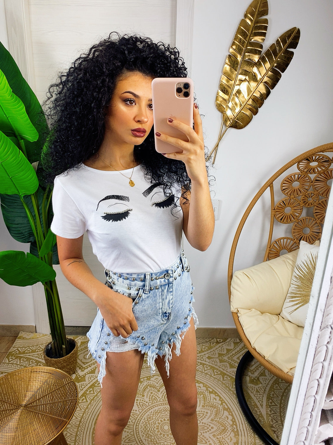 Short jeans chiaro con borchie