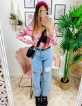 Jeans boyfriend zampa larga con maxi spacchi