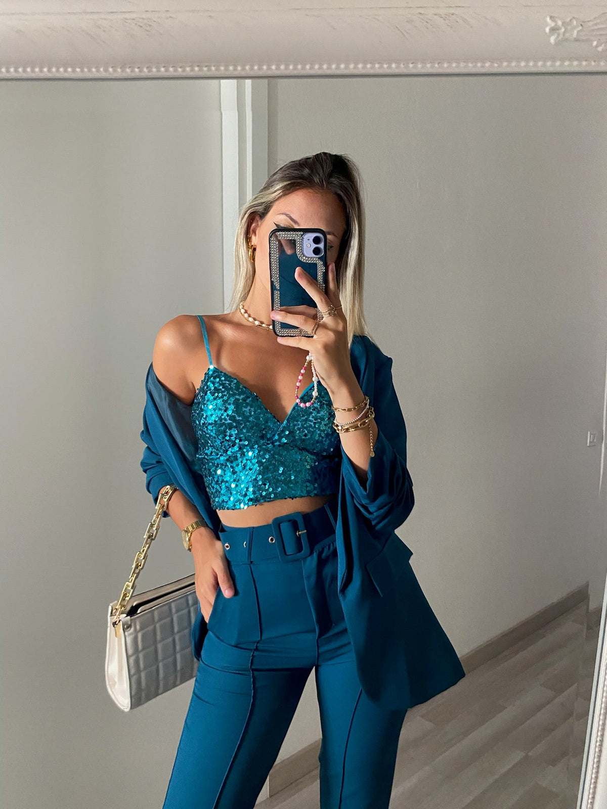 Top con paillettes petrolio