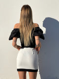 Gonna in tweed bianca con bottoni