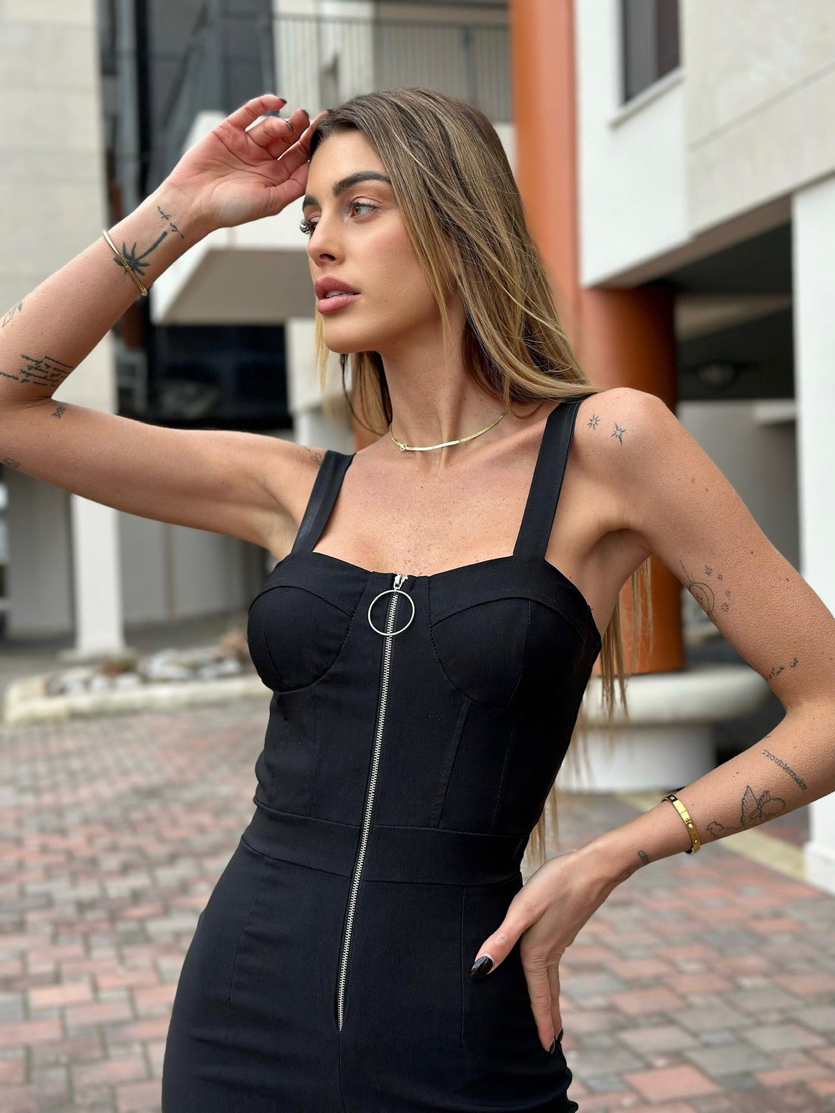 Tuta con zip e tasche