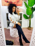 Abito in maglia con fiocchetti e paillettes