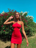 Abito rosso con incroci sulla schiena