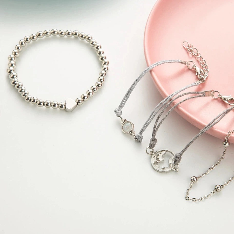Bracciale con mondo e dettagli argento