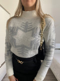 Maglione fiocco di neve bianco e argento