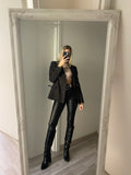 Pantalone in ecopelle con trasparenze