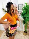 Maglia crop arancio con cuori