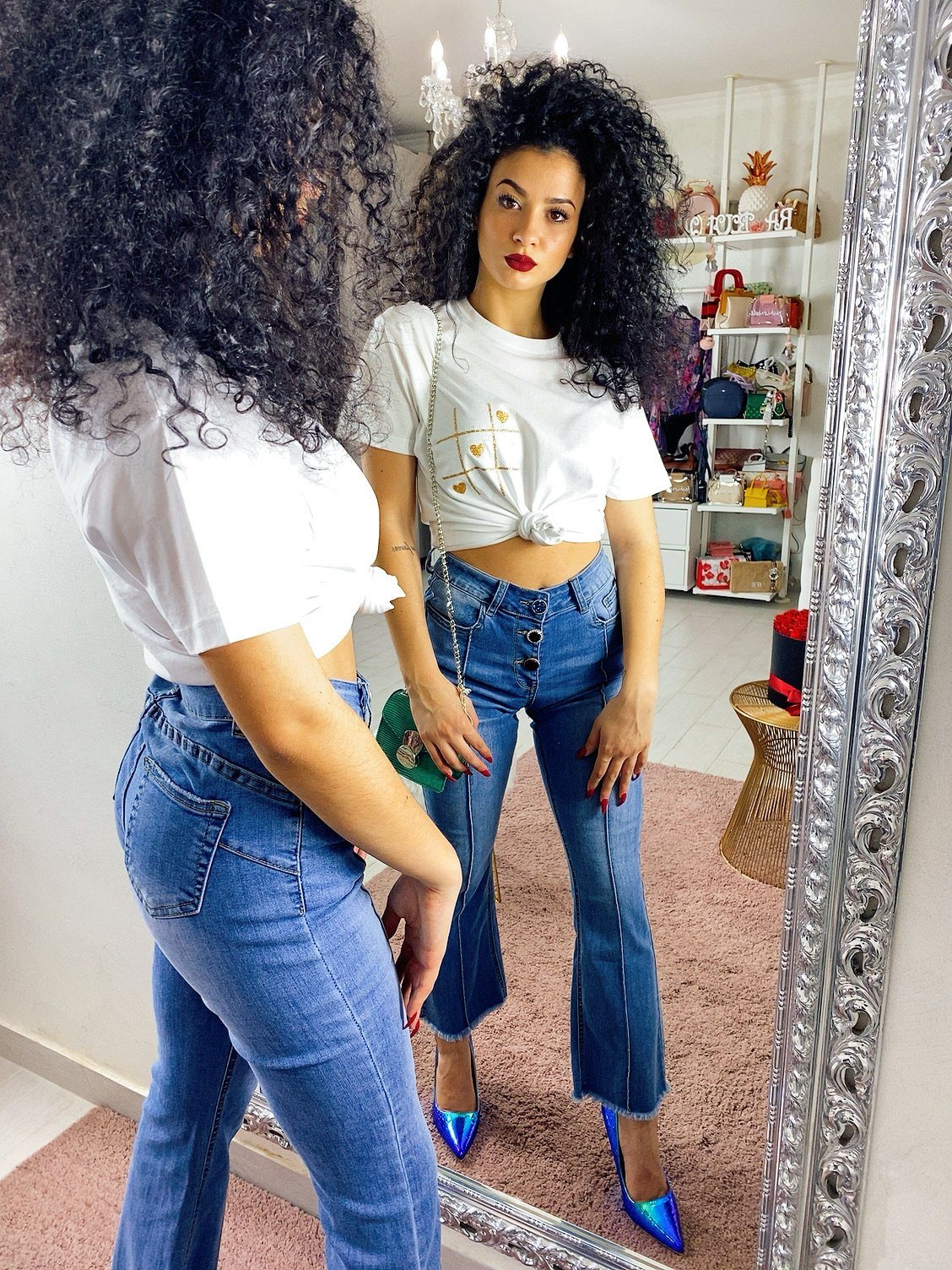 Jeans con bottoni in strass