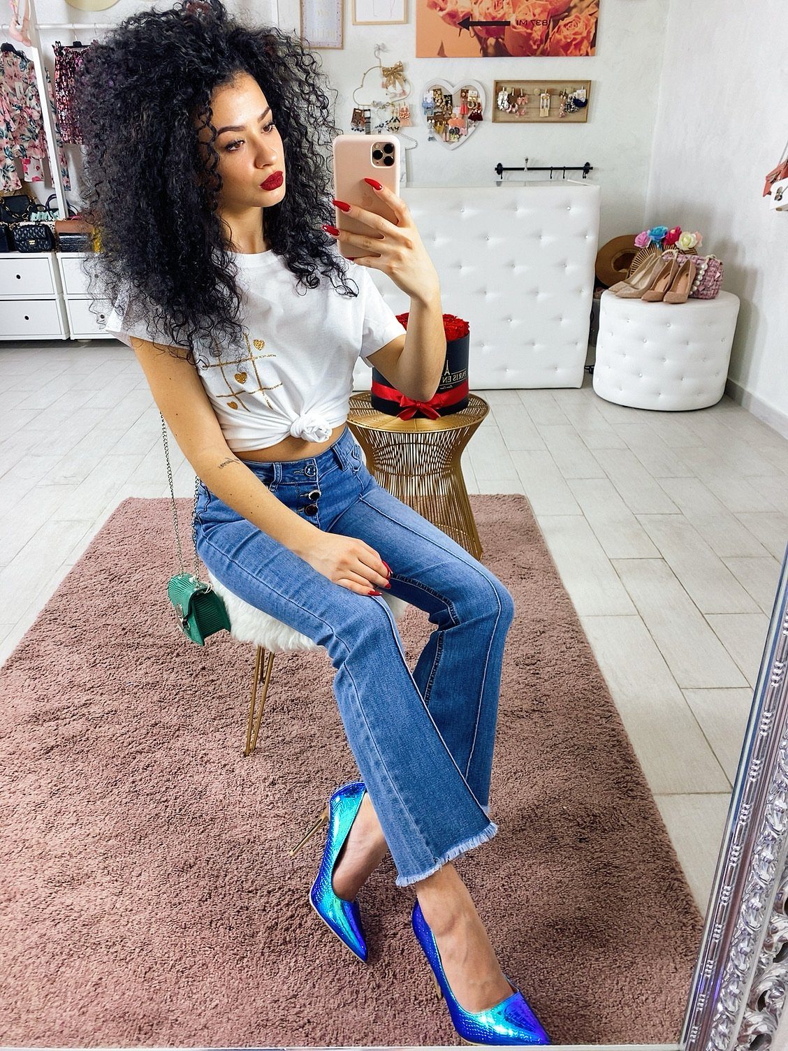 Jeans con bottoni in strass
