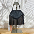 Mini pochette con frange
